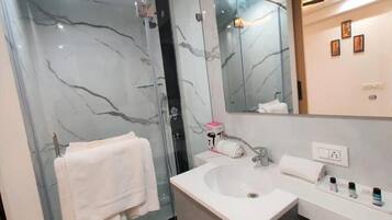 Shower, towels, soap, shampoo