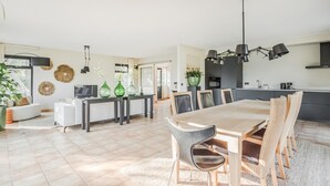 A modern kitchen with a dining area. - 4 bedroom lovely home in Havelte (Havelte)
