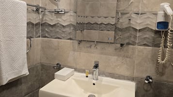 Free toiletries, hair dryer, bathrobes, slippers