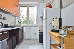 Fridge, stovetop, coffee/tea maker, cookware/dishes/utensils