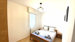 Room - Charming apartment 2 to 4 people 200m from the beach with wifi (PLOEMEUR)