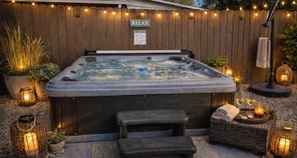 Cozy & Cheerful w/Hot Tub, Hammocks, Fenced Yard, & BBQ! Near Airport & DT!