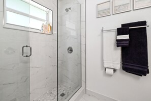 Shower, towels, soap, shampoo