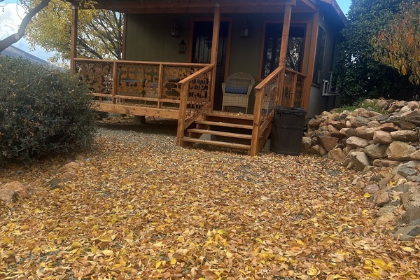 Front view of cabin showing enclosed front porch