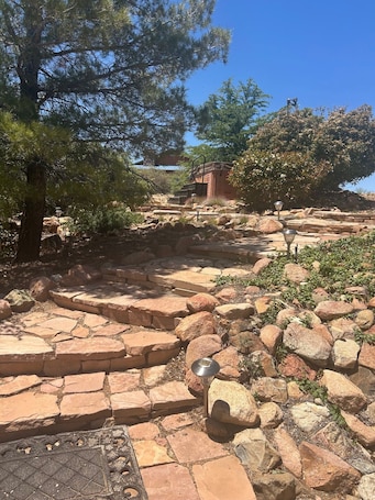 Property grounds. Beautiful cabin retreat with gorgeous views! Pet friendly with wide open spaces.