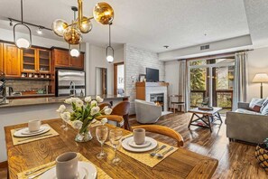 TV, fireplace, books, offices