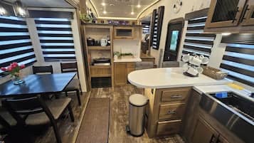 Coffee/tea maker, fridge, microwave, oven