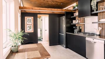 Fridge, stovetop, dishwasher, coffee/tea maker