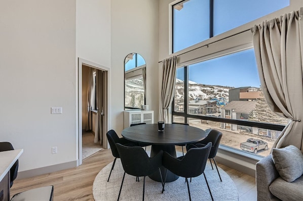 Enjoy a scenic view of the surrounding mountains from this room's large window.