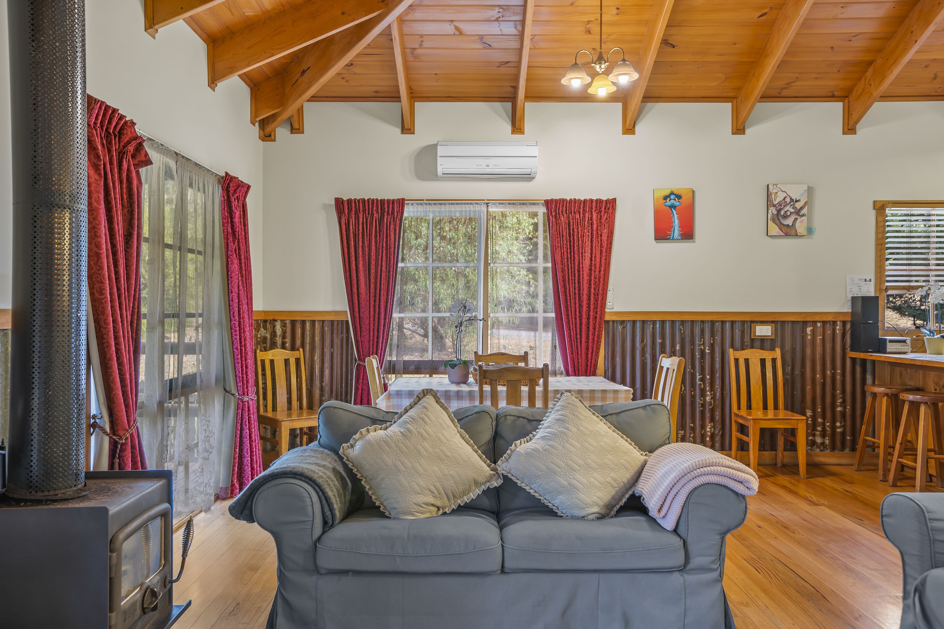 Traditional Cottage, Partial Lake View | Living area | 50-inch LED TV with cable channels, fireplace, DVD player