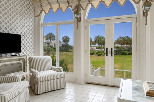 This villa offers stunning views of the ocean and the calming sound of the waves