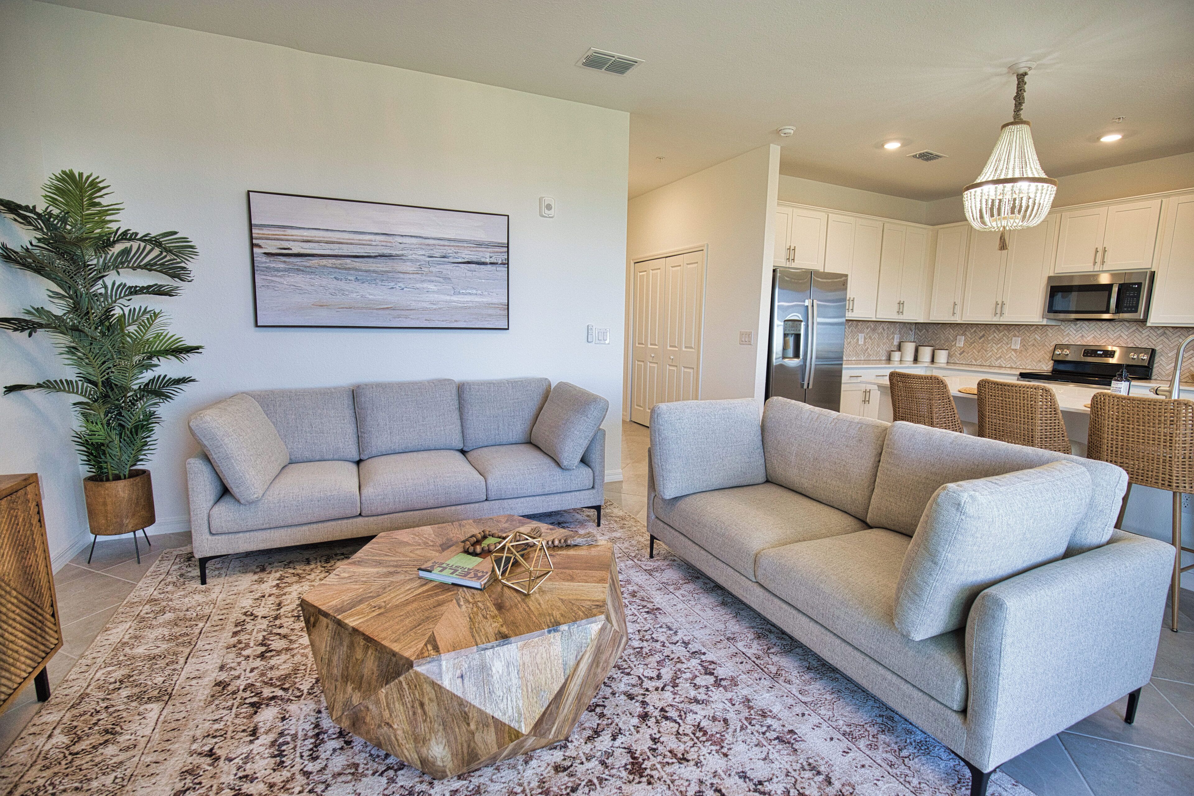 BRAND NEW CORNER CONDO @ WELLEN GOLF & COUNTRY CLUB- VIEWS OF LAKE ON 10TH HOLE.