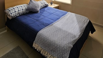 Suite Deluxe | 1 habitación, sábanas de algodón egipcio y ropa de cama de alta calidad
