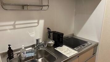 Fridge, microwave, stovetop, cookware/dishes/utensils