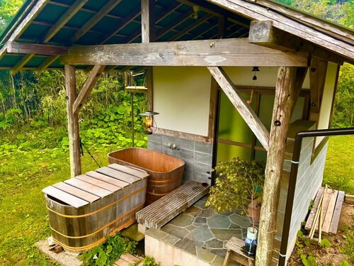 A private house surrounded by mountains and rice fields / Isumi Chiba