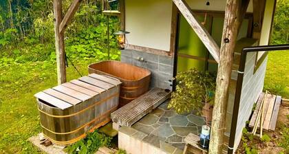 A private house surrounded by mountains and rice fields / Isumi Chiba