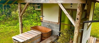 A private house surrounded by mountains and rice fields / Isumi Chiba