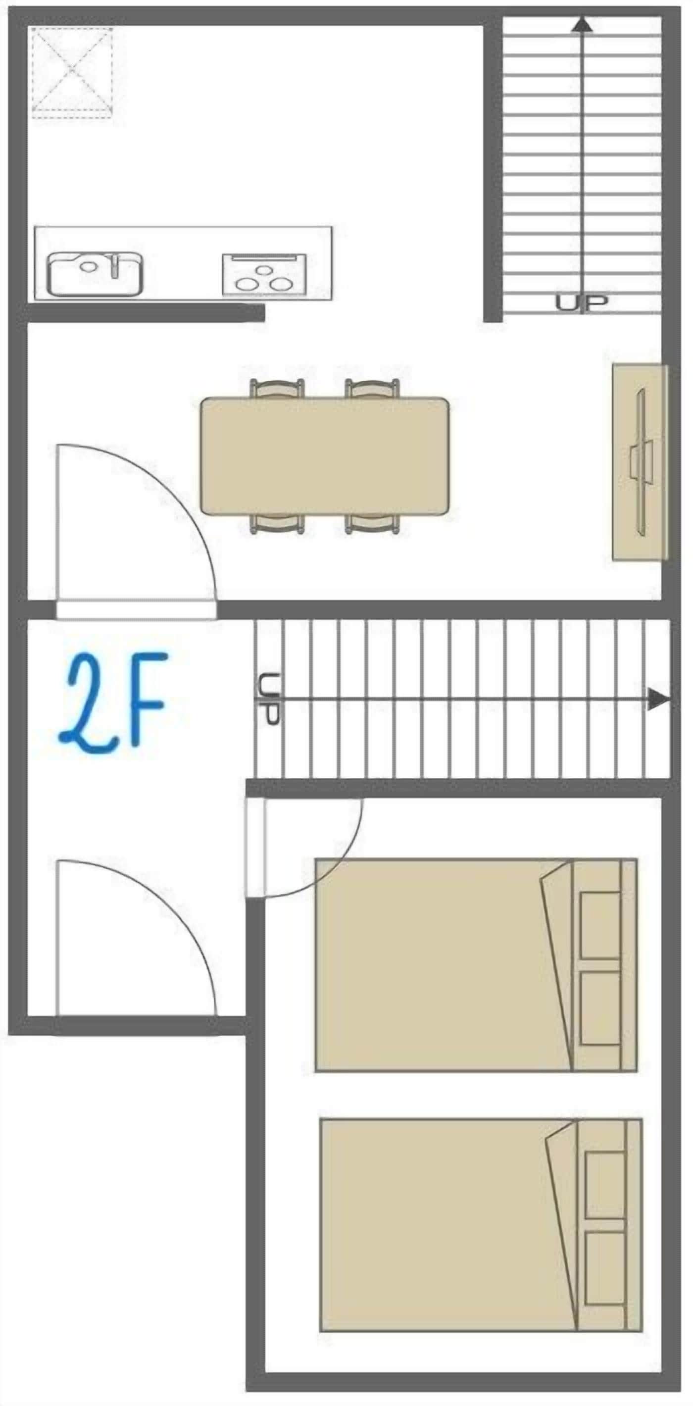 A 2F hotel room layout with a bed, a desk, a chair, a wardrobe, and a bathroom.
