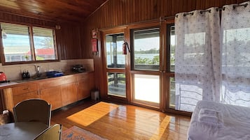 Basic Villa | Living area | 24-inch LED TV with cable channels
