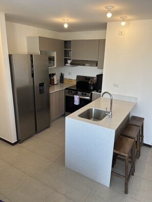 Fridge, microwave, oven, stovetop