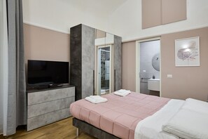 2 habitaciones, tabla de planchar con plancha, wifi y ropa de cama