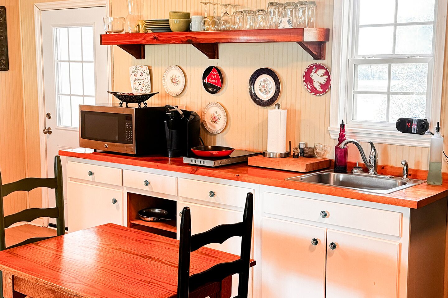Fridge, microwave, stovetop, coffee/tea maker