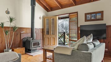Traditional Cottage | Living room | 50-inch LED TV with cable channels, fireplace, DVD player