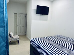 Apartamento Deluxe | 1 dormitorio, cortinas opacas, tabla de planchar con plancha