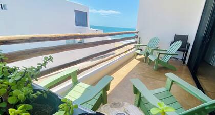 Apartment with mountain view, private balcony and access to beach front terrace.