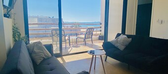 Apartment with mountain view, private balcony and access to beach front terrace.