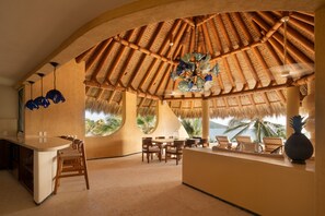 Areca 301 | Living area | 50-inch TV with digital channels - Mar de Coco Beach Front Villas (Barra de Potosi)