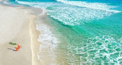 New Listing | Budget Friendly Beachfront Condo with Community Pool and Large Private Balcony | WiFi