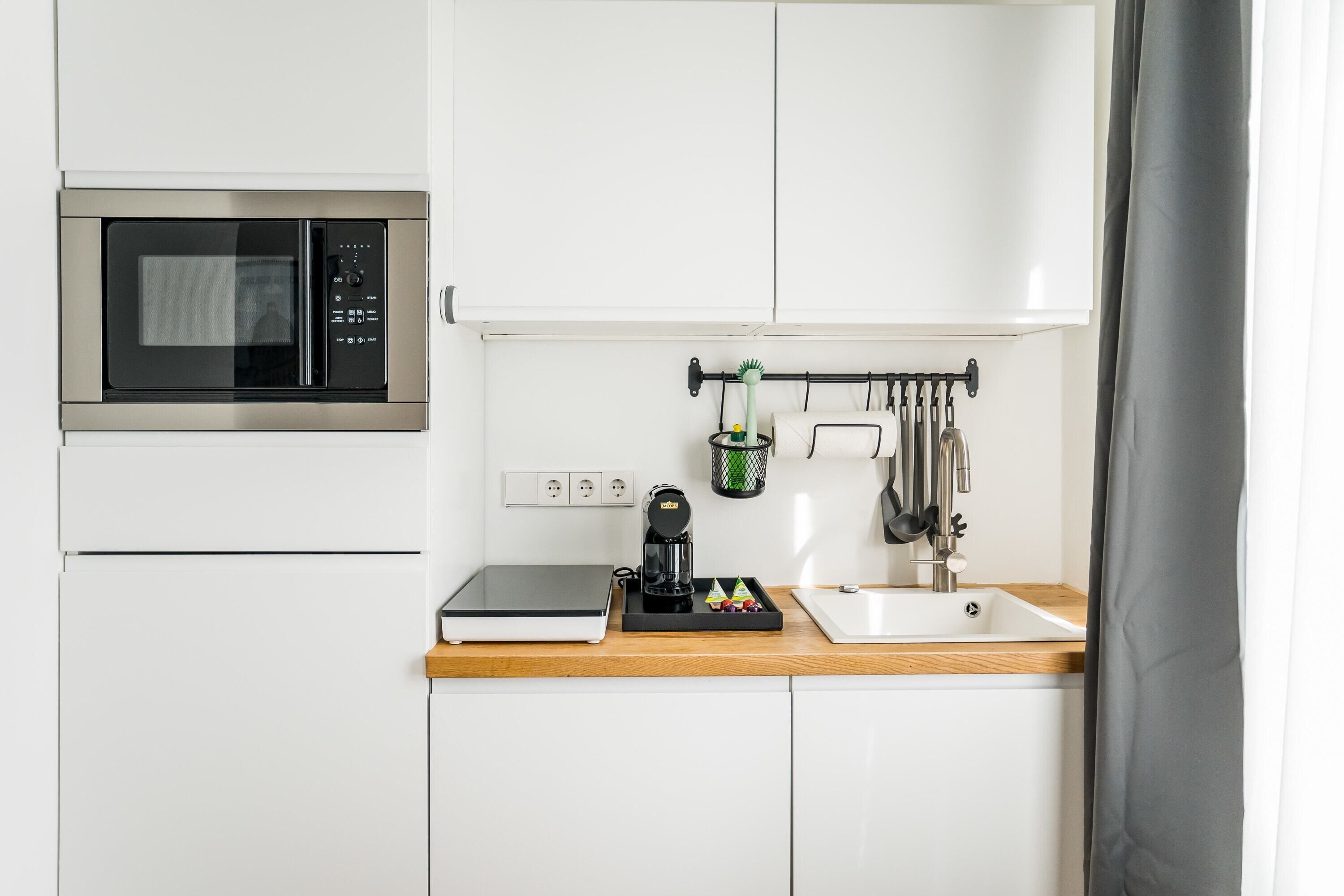 Fridge, microwave, dishwasher, coffee/tea maker