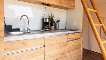 Fridge, microwave, stovetop, coffee/tea maker