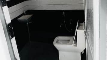 Deluxe Double Room, City View | Bathroom | Shower, rainfall showerhead, free toiletries, towels