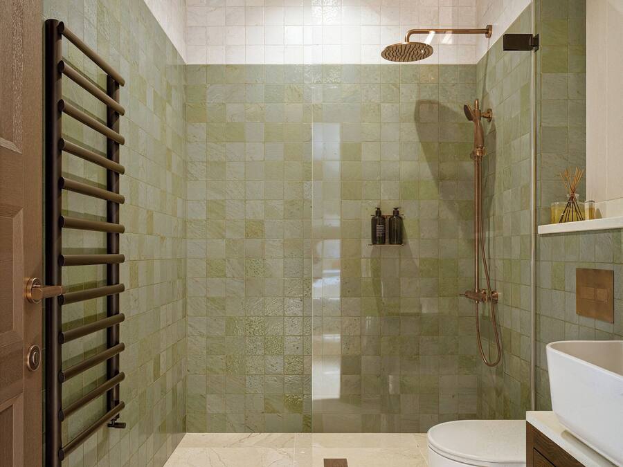 A bathroom with a shower, toilet, and sink.