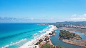 Beach nearby, white sand, free beach shuttle, sun-loungers