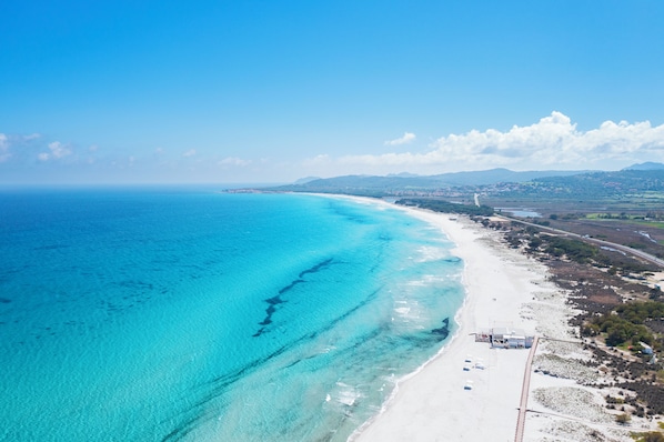 Beach nearby, white sand, free beach shuttle, sun-loungers