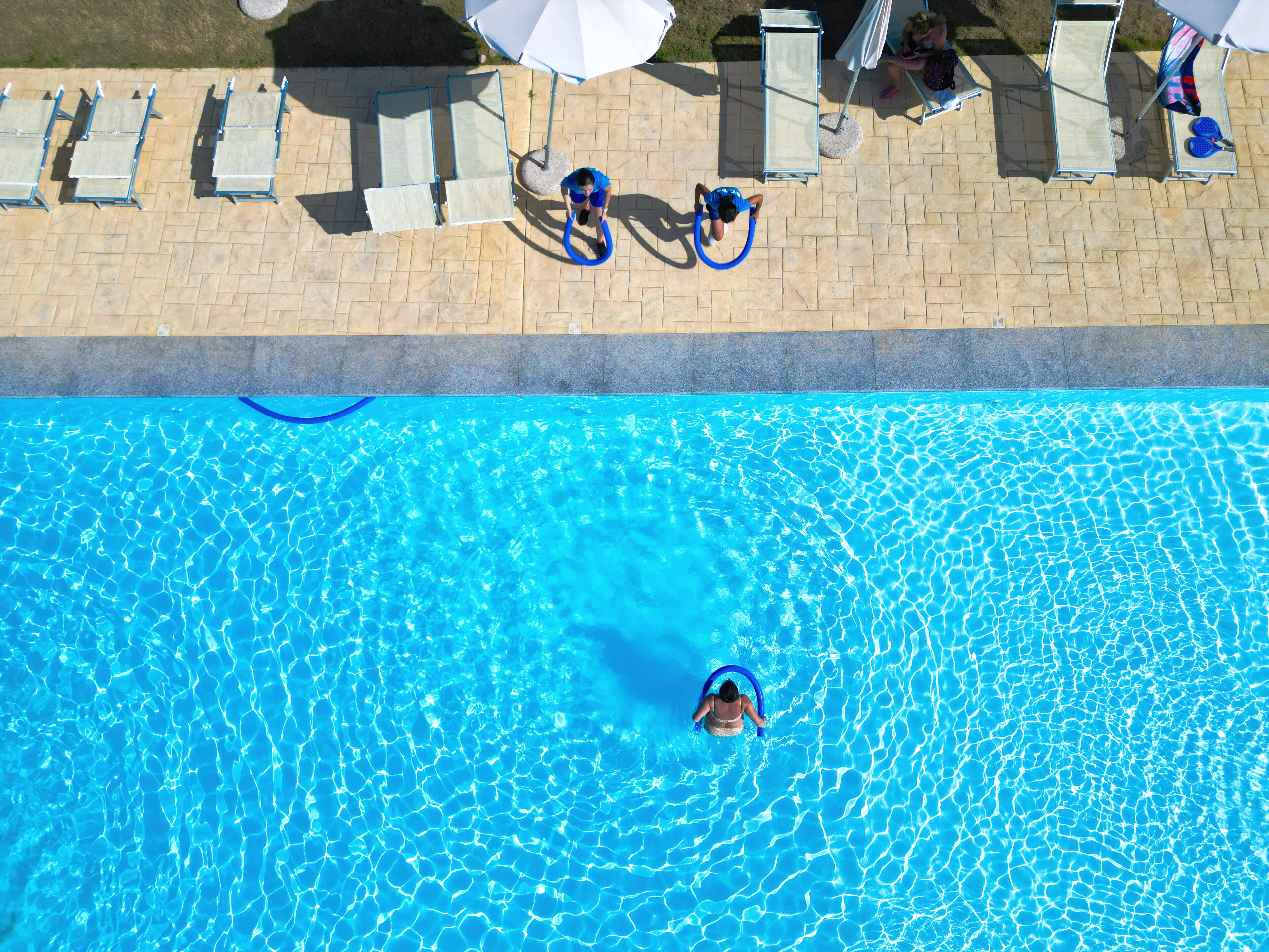 Outdoor pool, pool umbrellas, pool loungers