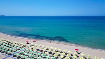 Private beach, white sand, sun-loungers, beach umbrellas