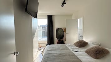 2 habitaciones, tabla de planchar con plancha, wifi y ropa de cama