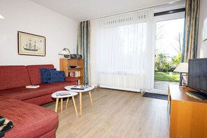 Smart TV, DVD player, books - Holiday home Speckert WG1 (Duhnen)