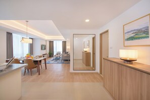 Deluxe Room, 2 Bedrooms | Living area