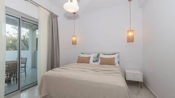 Luxury Suite, Pool View | 2 bedrooms, memory foam beds, individually decorated