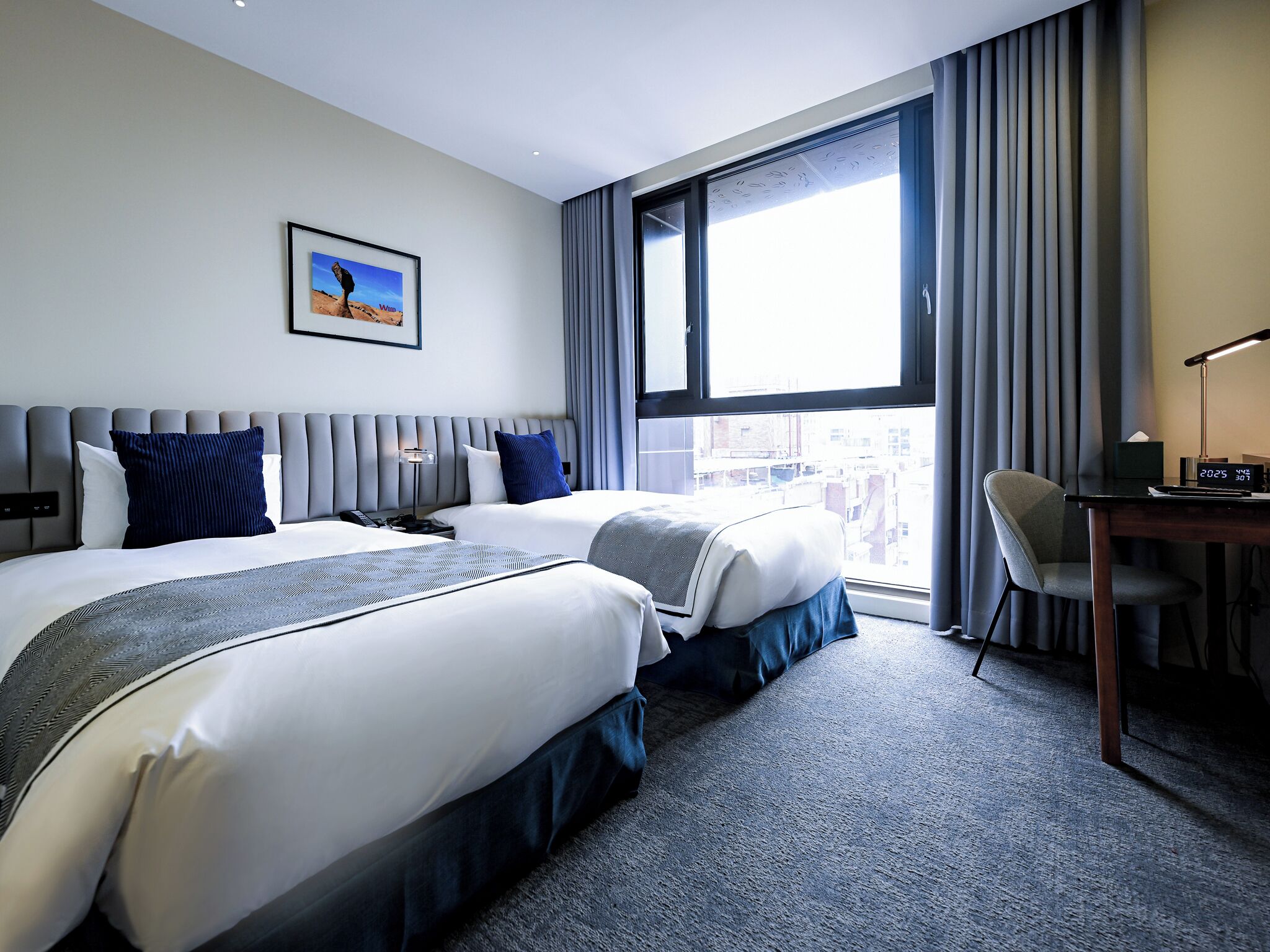 Standard Twin Room | In-room safe, desk, laptop workspace, blackout curtains