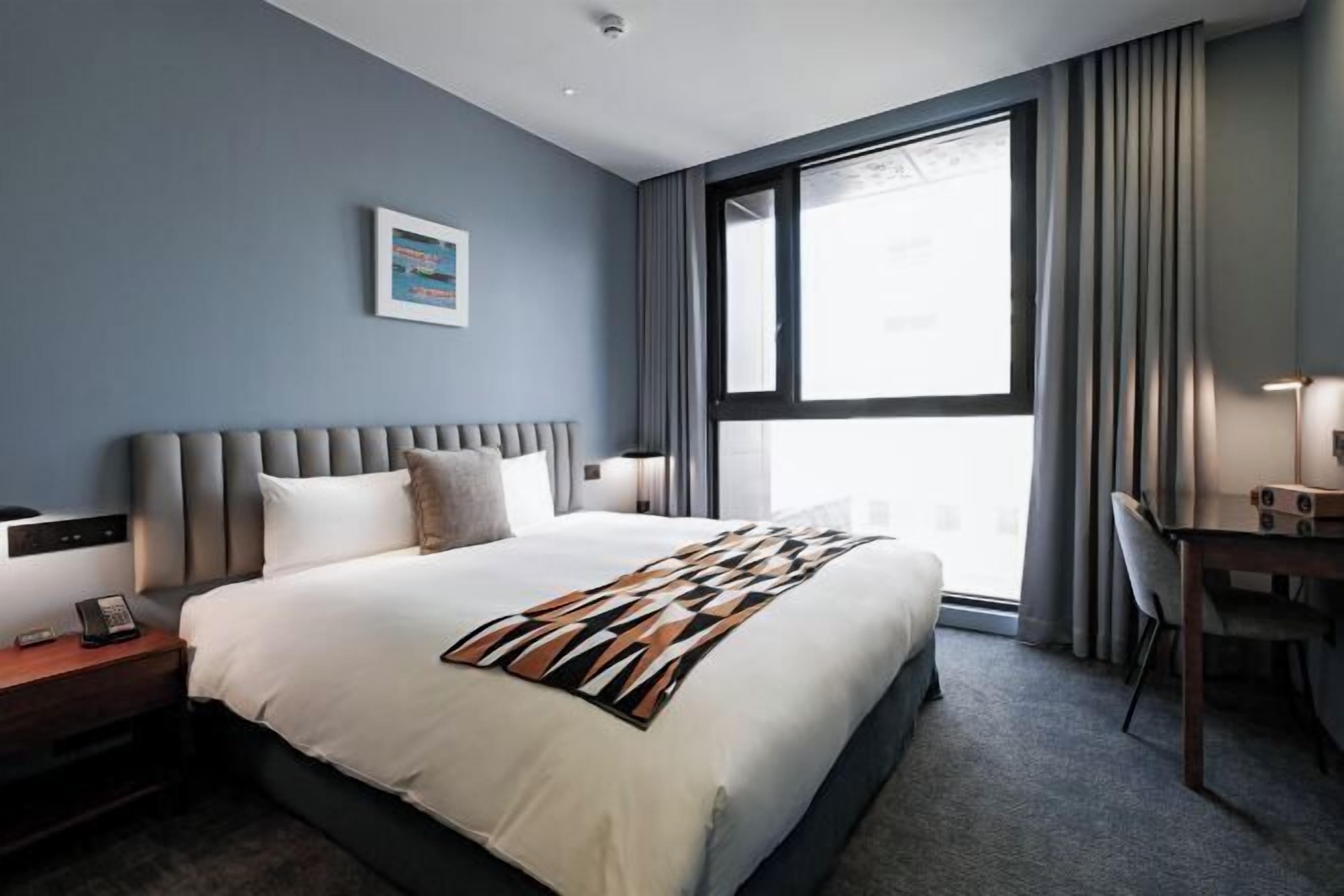 In-room safe, desk, laptop workspace, blackout curtains