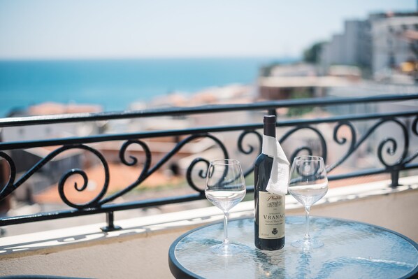 Quarto luxo, vista para a praia | Terraço/pátio