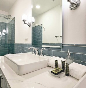 Shower, hair dryer, towels