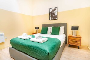 1 habitación, tabla de planchar con plancha, wifi y ropa de cama 