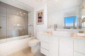 Shower, hair dryer, towels